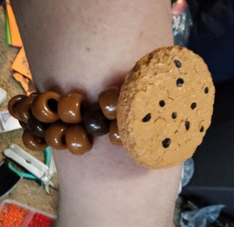 small basic cuff with charm = $6